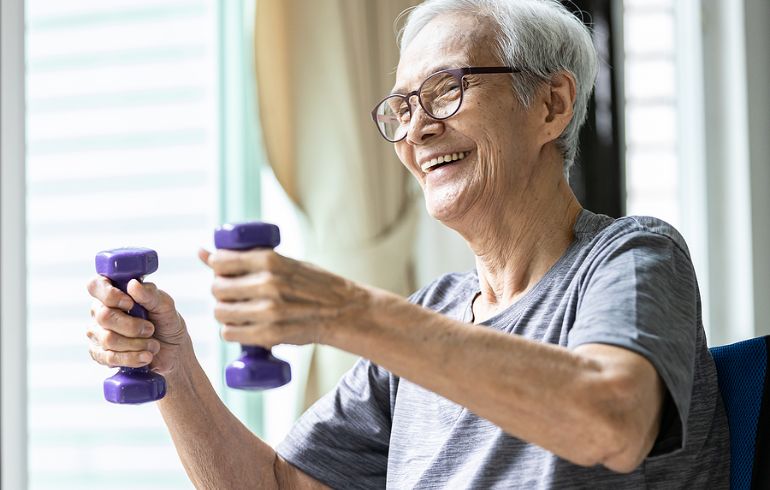 Person with osteoporosis exercising safely